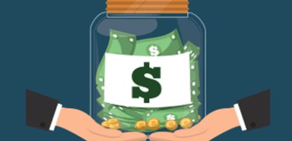 Jar of savings held by businessman
