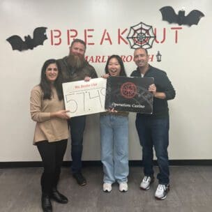 Customer success teammates at an escape room