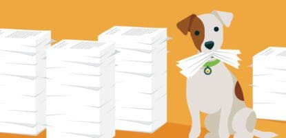 dog with invoice stacks